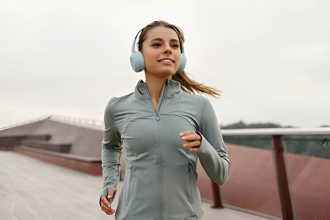 Woman Jogging Outdoors While Wearing Comfortable Athletic Apparel